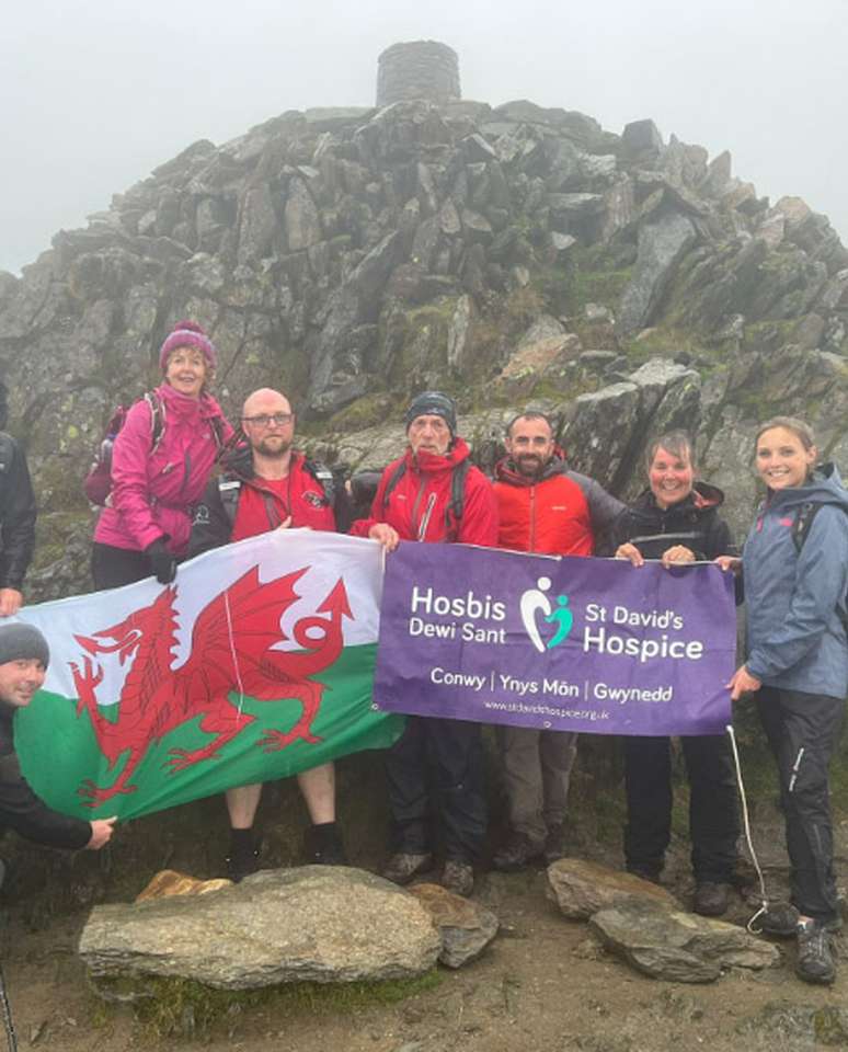 A group of 8 walkers took on three of the highest mountains in Wales to raise funds for St David's Hospice